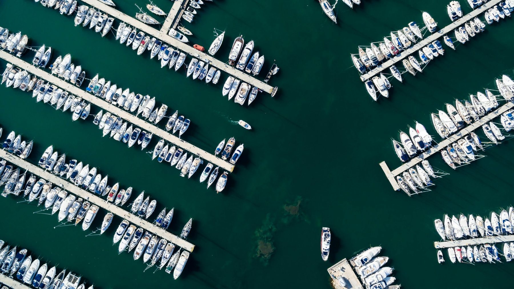 Representative aerial photograph of marina docks and boats